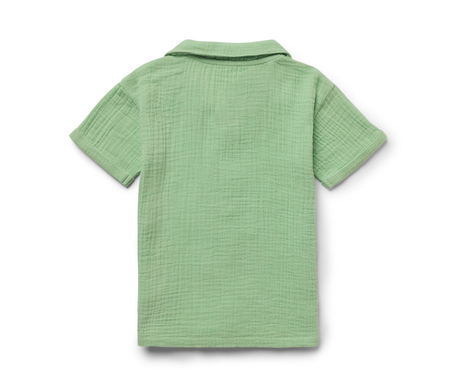 Vue détaillée de dos d'une chemise en mousseline vert clair pour enfant avec col.