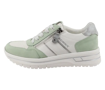 Une seule basket Romika en blanc et vert menthe est posée sur une surface blanche.