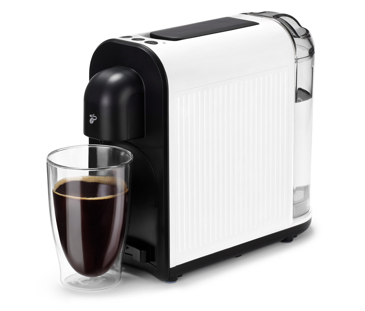 Une machine à café blanche Cafissimo now white avec une tasse de café devant.
