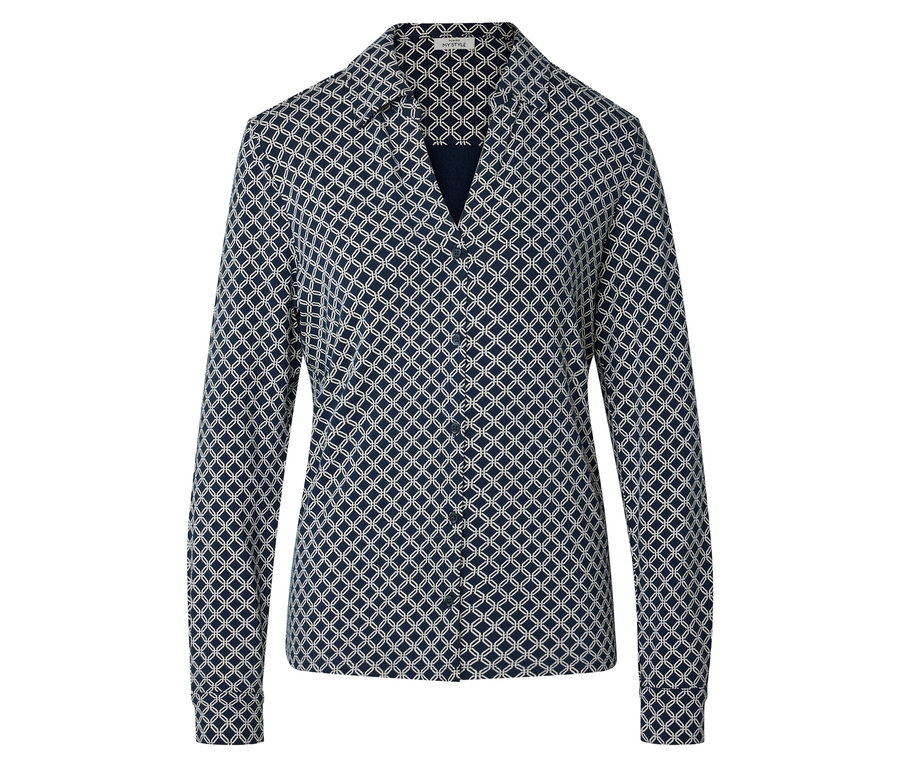 Blouse bleu marine à motif géométrique.