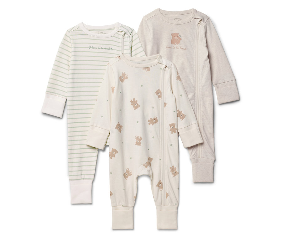 Trois pyjamas pour bébés avec fermeture éclair intégrale, dont un à rayures, un à motif d'ours et un à motif d'ours.