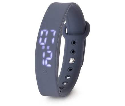 Montre numérique gris foncé avec bracelet en silicone, affichant 07:12, sur fond blanc.