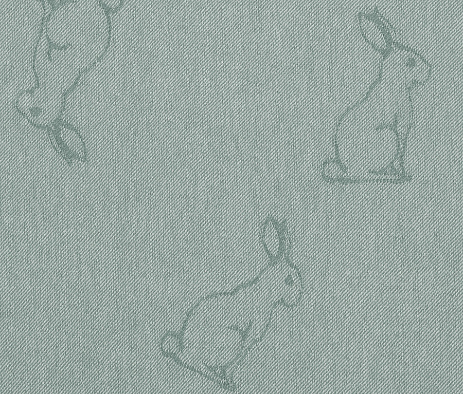 Tissu bleu clair avec trois contours de lapin. 3 linges de cuisine.