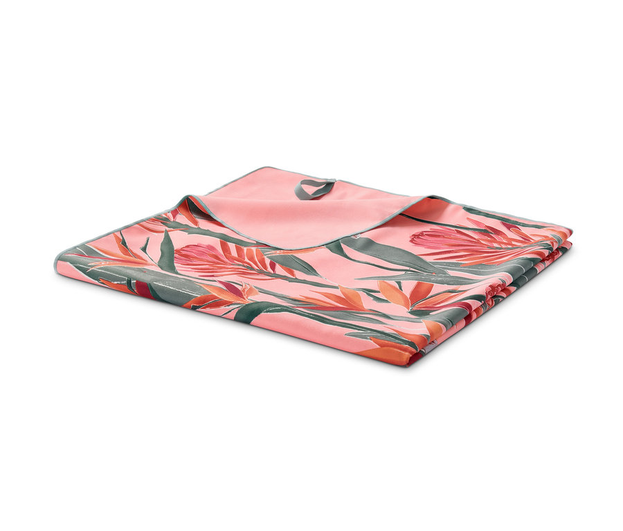 Très grand linge de plage en microfibres recyclées avec un motif tropical.