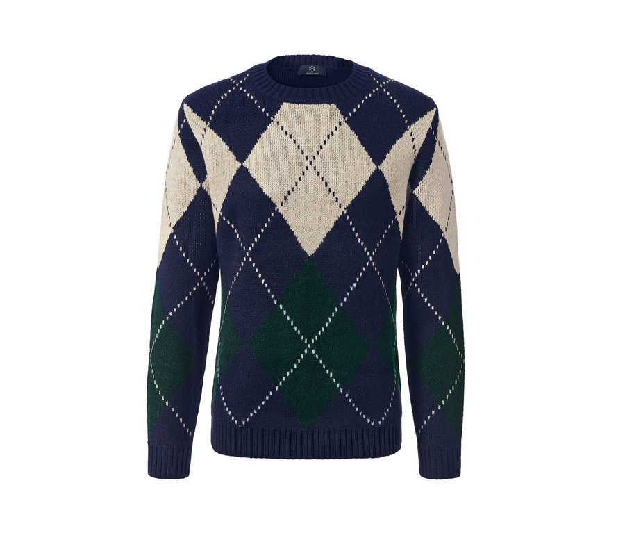 Pull en maille bleu marine à motif losanges bleu marine, crème et vert.