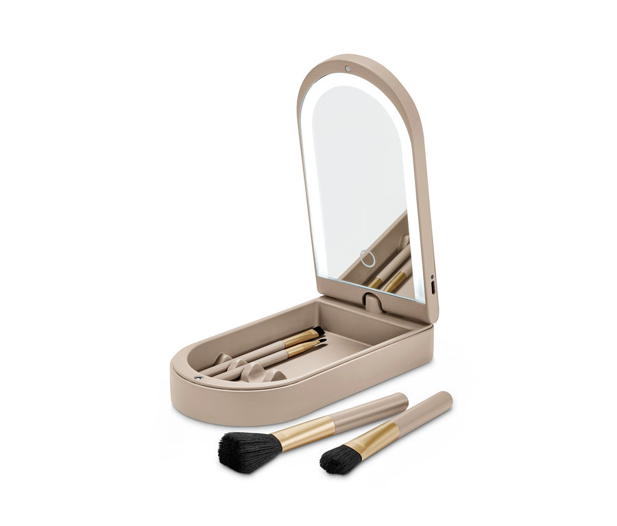Coffret à cosmétiques avec miroir LED et pinceaux de maquillage.