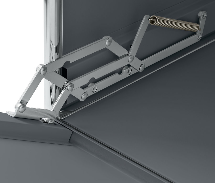 Détail du caisson métallique gris à roulettes « CN3 » avec abattant.