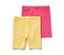 Deux leggings de cycliste pour enfant, un rose et un jaune.