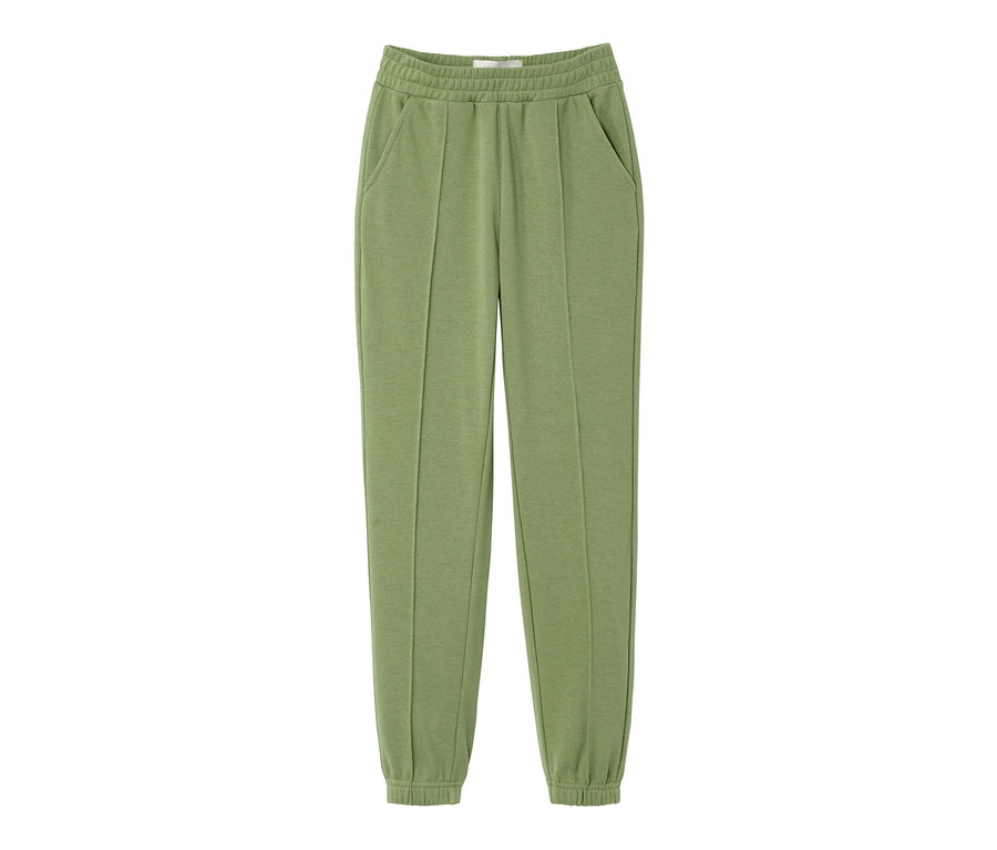 Un pantalon de survêtement vert pour enfant.