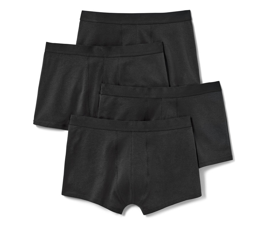 Quatre boxers noirs, 4 unités, disposés les uns sur les autres.
