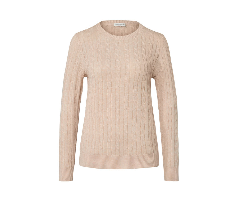 Pull en maille torsadée de couleur crème.