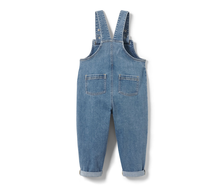 Salopette en denim bleu avec poches à l'arrière.