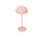 Une lampe de table à LED sans fil rose sur fond blanc.