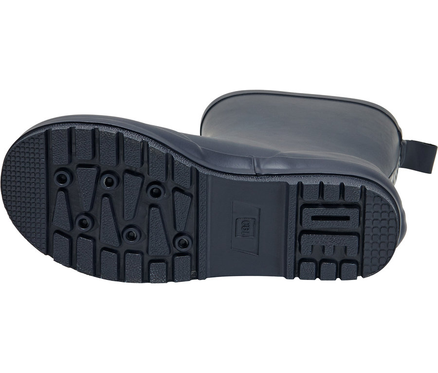 Gros plan d'une botte en caoutchouc bleue avec la semelle tournée vers l'avant.