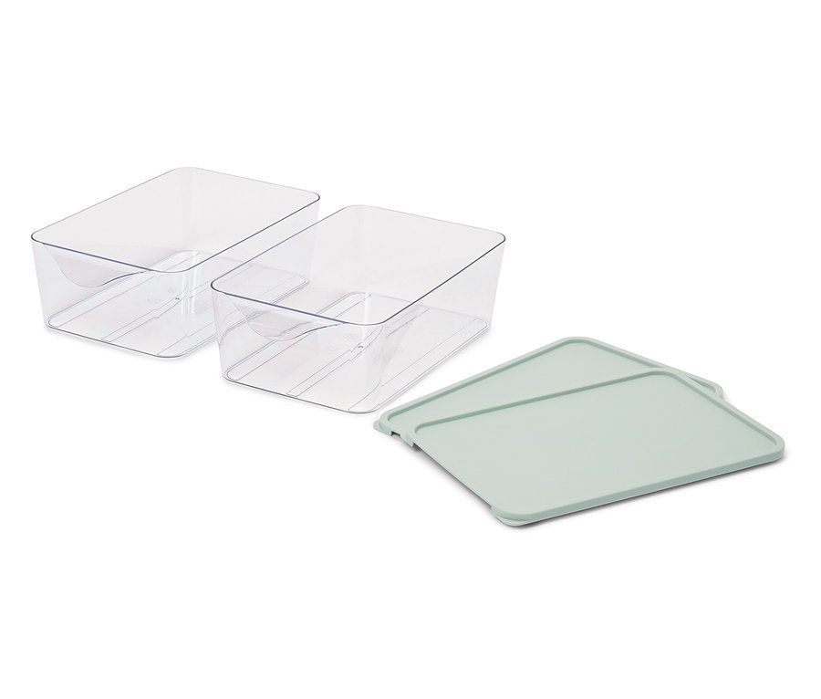 Deux contenants en plastique transparent et un couvercle vert.