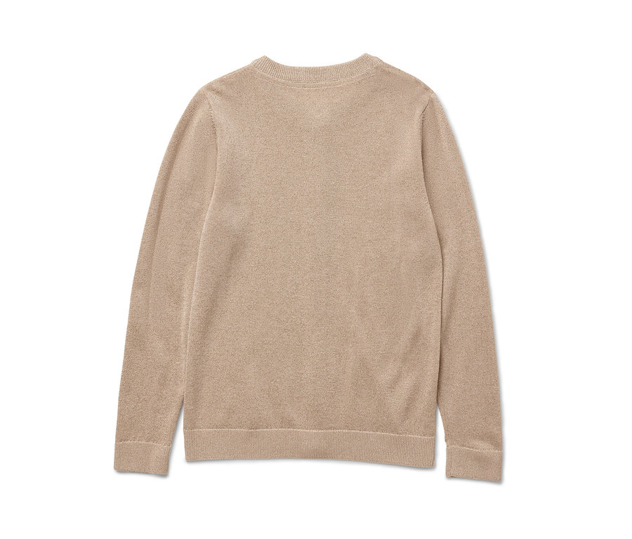 Vue détaillée d'un cardigan scintillant pour enfant.