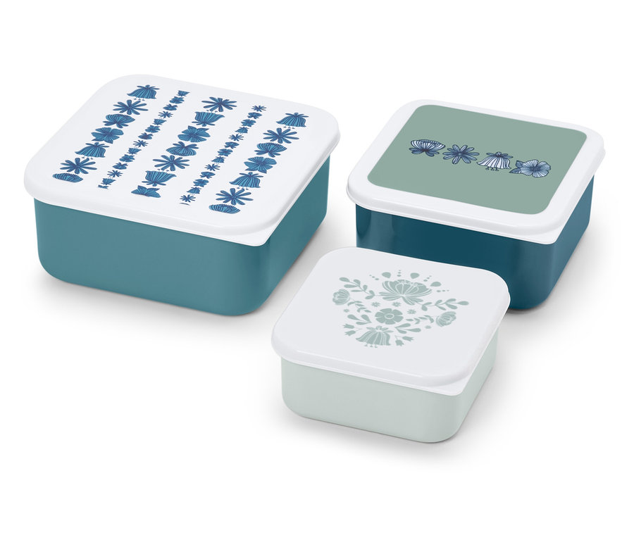 Un ensemble de trois boîtes à lunch bleu-vert avec des motifs floraux sur les couvercles.