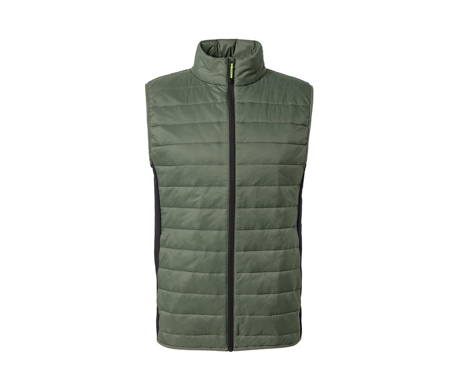 Gilet matelassé vert « pack light » avec fermeture éclair noire au centre.