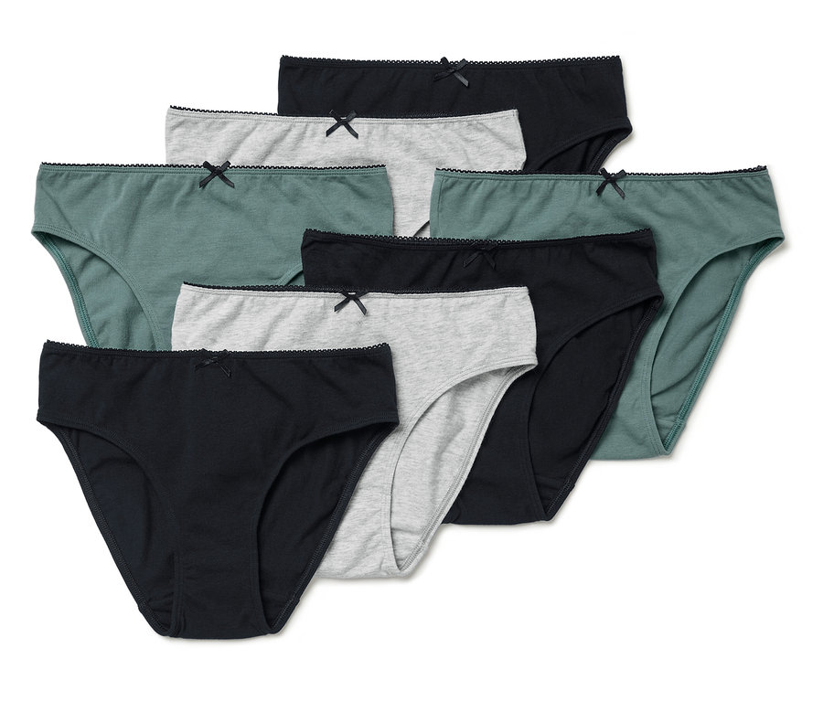 Un ensemble de sept culottes pour femmes de différentes couleurs (noir, gris et vert) avec un nœud décoratif.