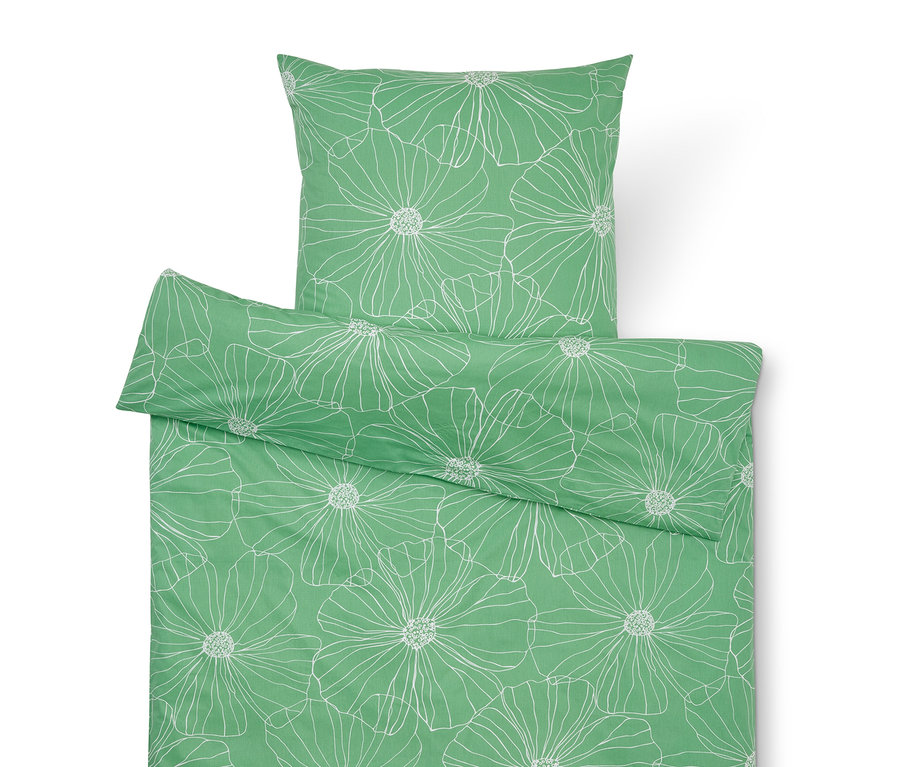 Linge de lit vert à motifs de fleurs blanches, composé d'une taie d'oreiller et d'une housse de couette.