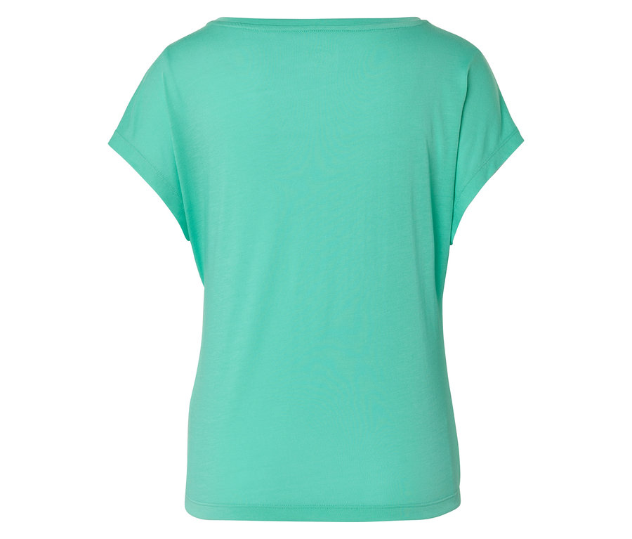 Gros plan d'un t-shirt turquoise à manches courtes et col rond, photographié de dos.