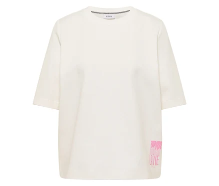 Sweatshirt CECIL crème à manches courtes avec un imprimé rose de palmiers et "LAVIE" sur l'ourlet.