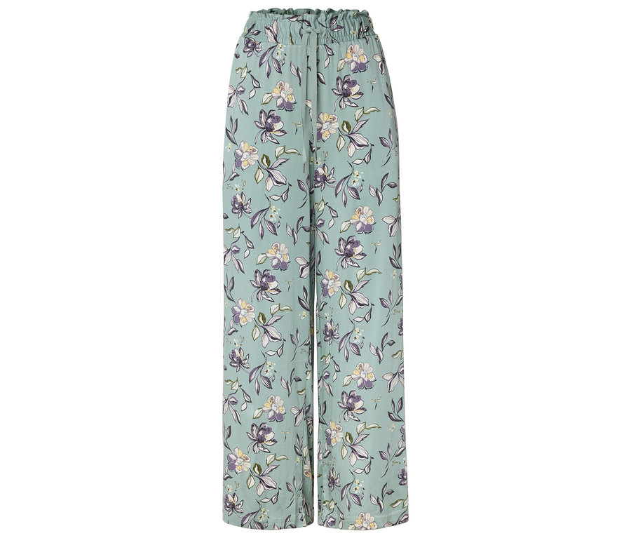 Pantalon large bleu clair à motif floral.