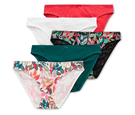 Cinq culottes en coton rouge, blanche, à motifs floraux, vert foncé et à feuilles colorées sont posées les unes sur les autres.