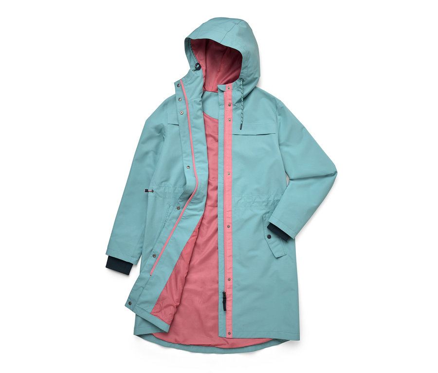 Veste à capuche couleur aqua avec doublure rose apparente, posée à plat sur fond blanc.