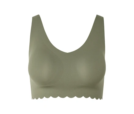 Soutien-gorge vert avec encolure en V et ourlet ondulé sur fond blanc.