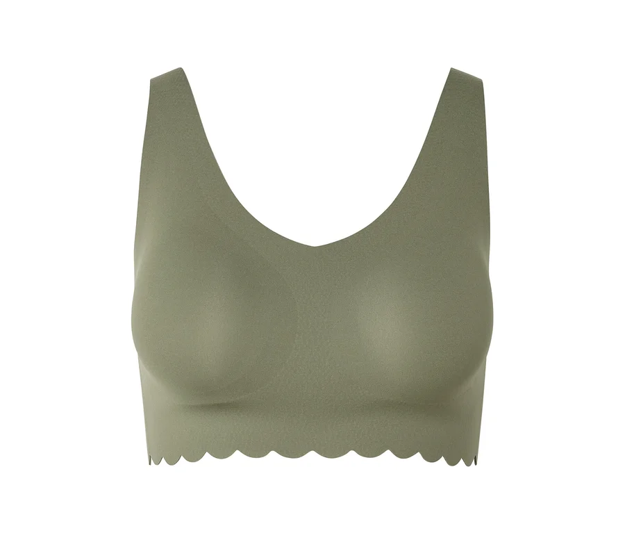 Soutien-gorge vert avec encolure en V et ourlet ondulé sur fond blanc.