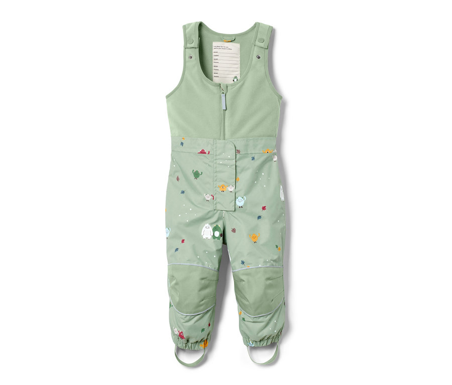 Pantalon de pluie thermique vert avec imprimé de monstres.