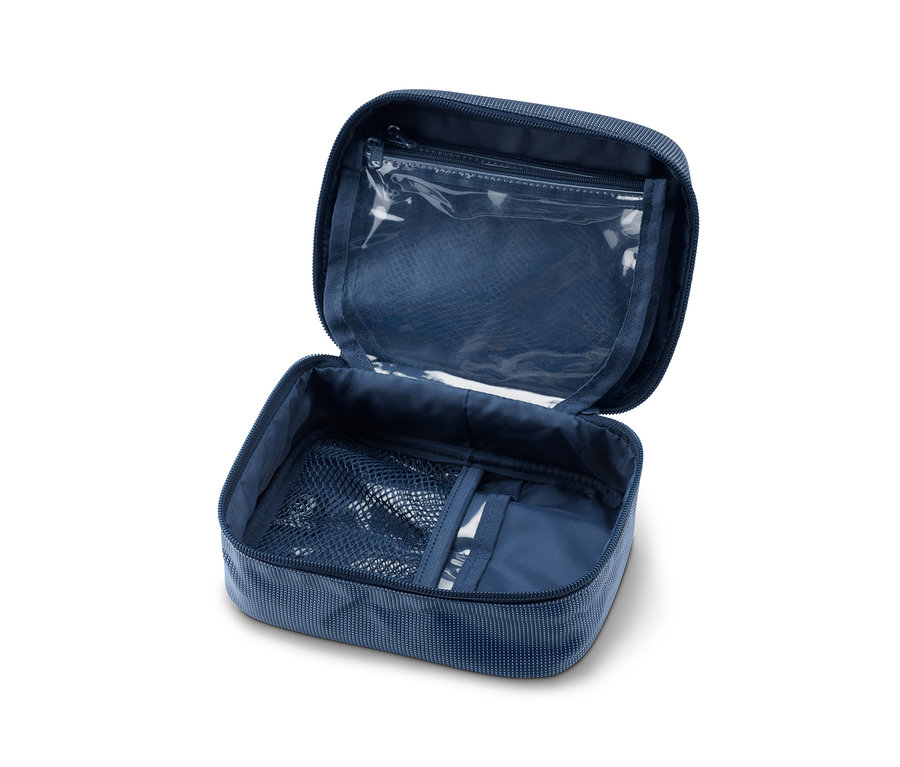 Trousse à pharmacie bleue ouverte avec poche intérieure zippée.
