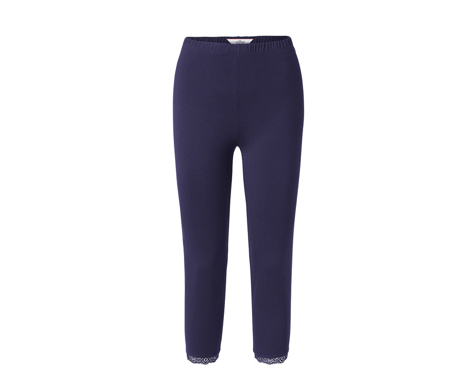 Legging court bleu foncé avec bordure en dentelle.