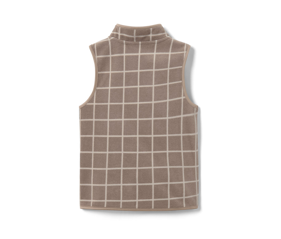 Vue détaillée d'une veste polaire à carreaux pour enfants.