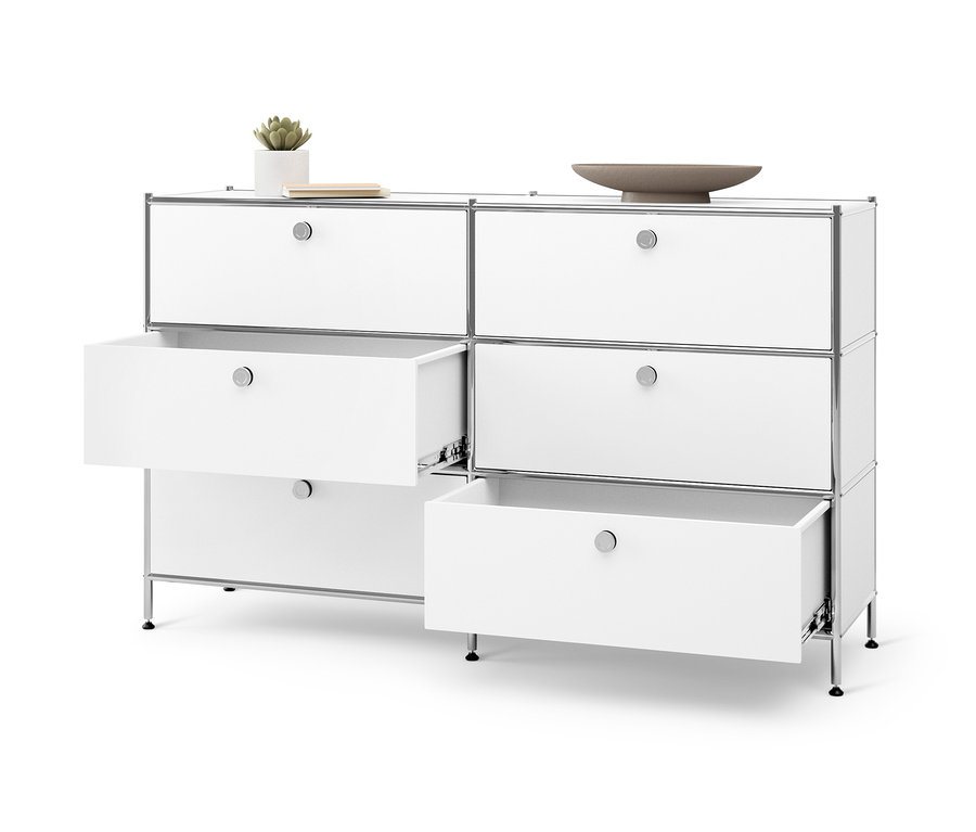 Commode en métal blanche « CN3 » avec 6 tiroirs dont deux sont ouverts.