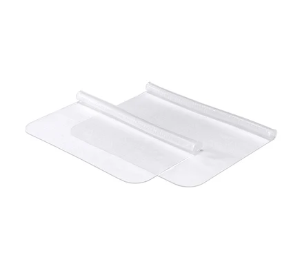 Deux films alimentaires en silicone, 2 pièces, enroulés sur un fond blanc.