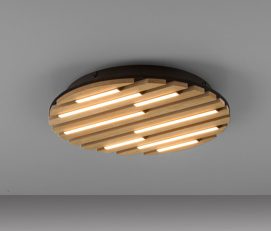 Plafonnier rond avec des lamelles en bois et des bandes LED.