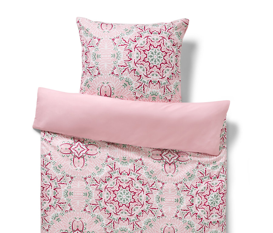 Parure de lit en microfibre rose de taille standard avec un motif floral.