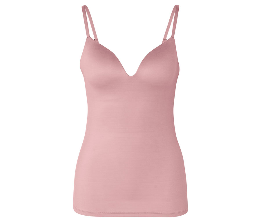 Haut bustier rose à fines bretelles en studio.
