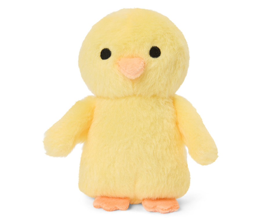 Poussin jaune en peluche debout.