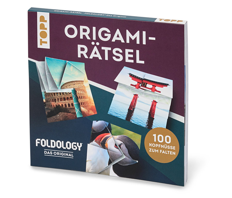 Le livre »Origami-Rätsel« est posé sur une table et présente des photos de créations d'origami.