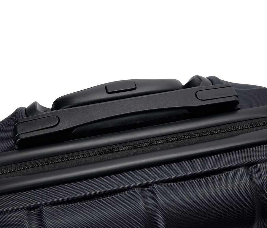 Gros plan d'une valise noire avec poignée et fermeture éclair.