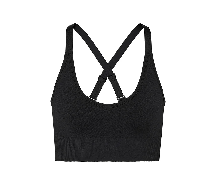 Soutien-gorge de sport noir avec bretelles croisées dans le dos.