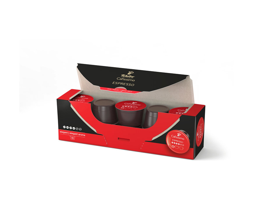 Boîte ouverte rouge et noire de 10 capsules de café Tchibo Cafissimo Espresso elegant. Plusieurs capsules marron foncé sont visibles à l'intérieur.