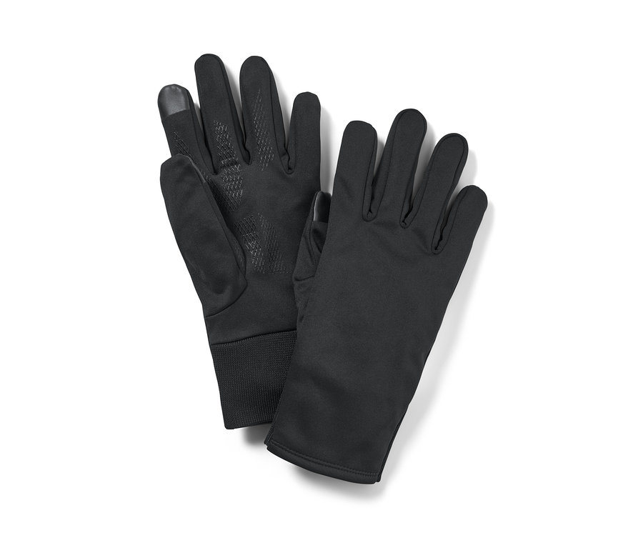 Deux gants noirs coupe-vent sont posés l'un à côté de l'autre.