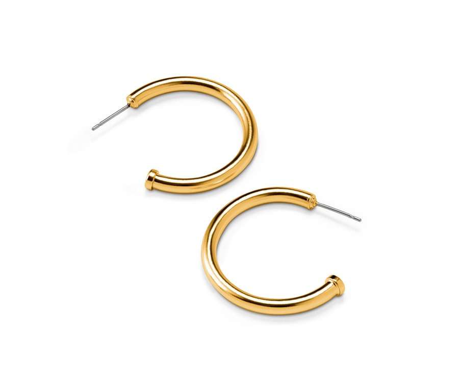 Deux créoles dorées avec pierre synthétique sur fond blanc.