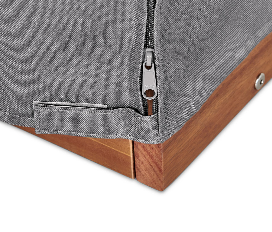 Détail d'une housse premium grise pour meuble de plage XXL avec fermeture éclair et cadre en bois.