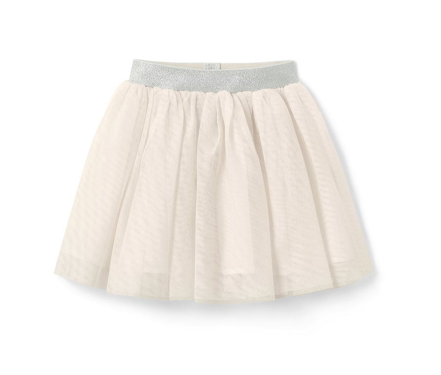 Une jupe en tulle enfant couleur crème avec une taille élastique argentée.