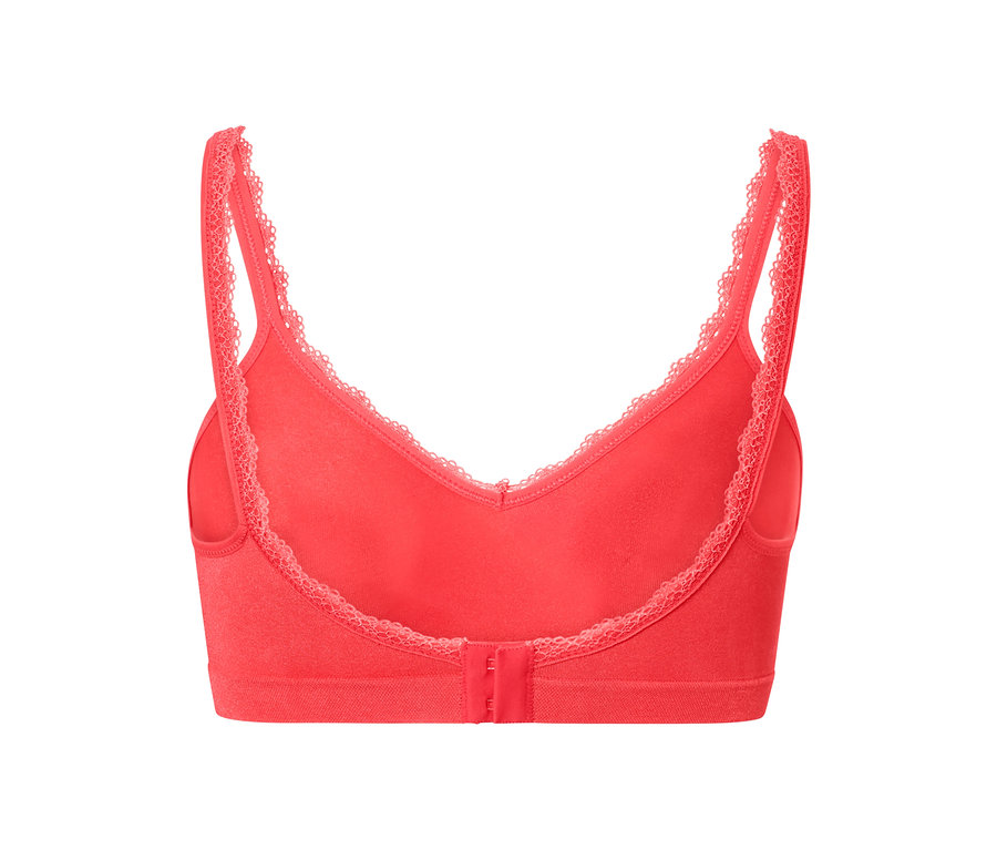 Gros plan sur l'arrière d'un soutien-gorge doux sans couture corail avec des détails en dentelle.